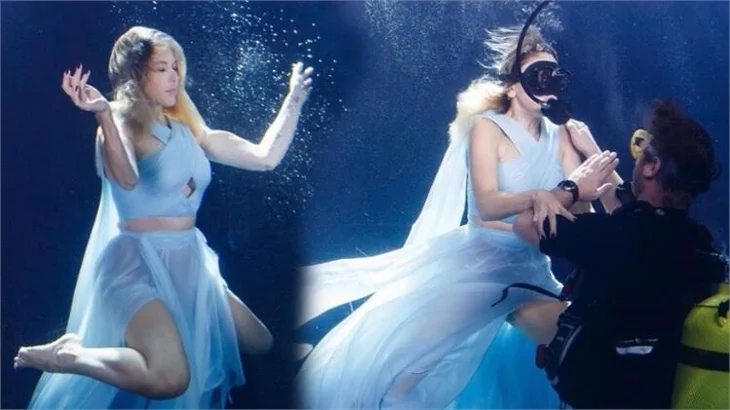 Hadise elbisesiyle havuza daldı!