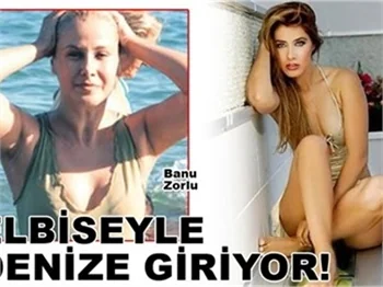 ELBİSEYLE DENİZE GİRİYOR