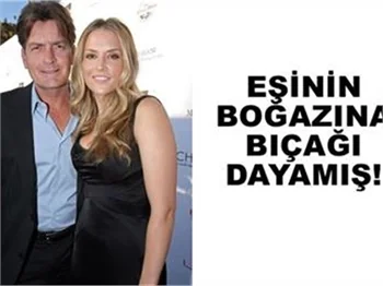 EŞİNİN BOĞAZINA BIÇAK DAYAMIŞ