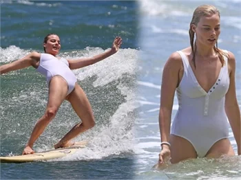 Margot Robbie sörf tahtası üzerinde..
