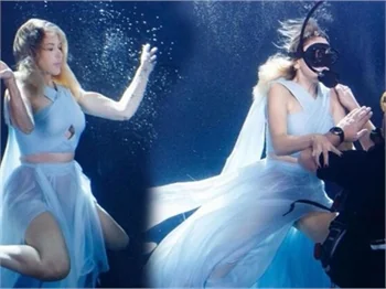 Hadise elbisesiyle havuza daldı!